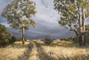 Australian landscape giclee print with gum trees and golden grass under a moody sky