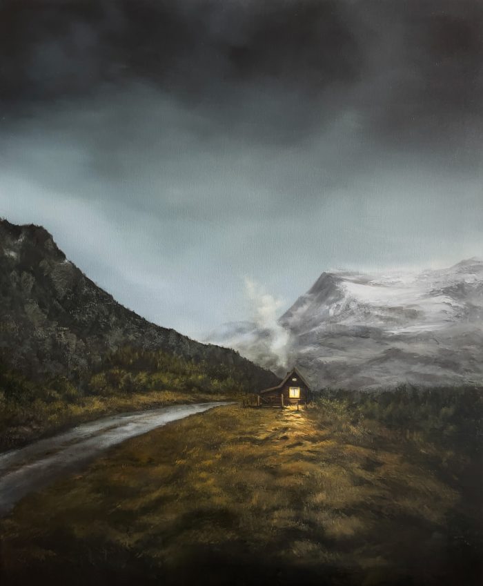 Archival landscape print featuring a glowing cabin beneath dark skies beside distant mountains in an atmospheric wilderness scene by Annie Hawkins.